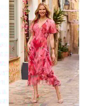 Made to impress - whatever the occasion Nothing flatters like a wrap dress Spun from beautiful floaty fabric Ruffle tiered hem, angel sleeves - all the dreamy details Gorgeous feather print is guaranteed to get compliments Accessorise with clutch bag and a glass of fizz (clutch bag optional)