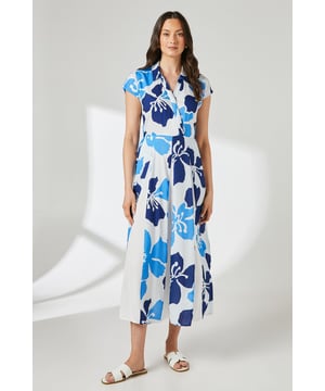 Elegant wrap bodice design with feminine godet detail for graceful movement
        Sophisticated collared neckline adding structure to the flowing silhouette
        Flattering midi length with subtle flare from the godet inserts
        Short cap sleeves offering comfortable coverage for daytime wear
        Striking floral print that captures attention without overwhelming
    
    This Principles midi dress showcases a beautiful floral pattern that brings a refreshing touch to your daywear collection. The wrap bodice creates a flattering silhouette while the godet detail adds graceful movement as you walk. Style with white leather sandals as shown for casual weekend brunches or family gatherings. For a more polished daytime look, pair with a structured straw tote and delicate gold jewellery. The versatile design transitions effortlessly from garden parties to casual office settings when worn with a lightweight cardigan and ballet flats. The breathable viscose fabric ensures comfort throughout the day, while the collared neckline adds a touch of sophistication. This dress works beautifully for outdoor events or leisurely afternoon teas where comfort meets style.