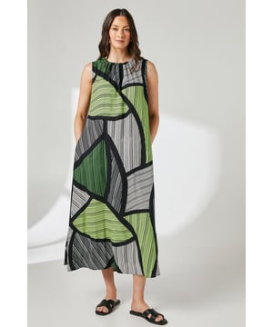 Striking geometric linear print in contrasting tones creates a bold visual statement
        Elegant tie back detail adds a feminine touch to this contemporary design
        Flattering midi length falls gracefully to mid-calf for versatile styling options
        Sleeveless crew neckline offers a clean, sophisticated silhouette
        Lightweight woven viscose fabric ensures comfort and beautiful drape throughout the day
    
    This captivating Principles midi dress combines artistic linear prints with a relaxed silhouette for effortless daywear style. The voluminous cut creates movement and fluidity as you walk, while the tie back detail adds a subtle feminine flourish. Style with flat leather sandals and a woven tote for weekend farmers' markets or casual brunches. For a more polished daytime look, pair with white trainers and a denim jacket, adding statement earrings to highlight the graphic pattern. The versatile midi length works beautifully for family gatherings or garden parties when styled with espadrilles and a lightweight cardigan. This dress transitions seamlessly from casual coffee dates to afternoon gallery visits-simply customise your accessories to suit the occasion.