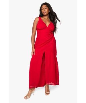 Flowing chiffon maxi dress with elegant patterned detailing
        Flattering V-neckline with gathered bust design
        Sleeveless silhouette with comfortable wide straps
        Dramatic front split for effortless movement
        Floor-sweeping length creates a graceful silhouette
    
    Make a striking impression at your next special occasion with this beautifully crafted chiffon maxi dress from Boohoo. The flowing fabric drapes elegantly around your curves, whilst the gathered bust and V-neckline create a feminine, flattering shape. The bold front split adds a touch of drama and allows for easy movement on the dance floor. Style with strappy metallic heels as shown and delicate gold jewellery to complete your look. Perfect for summer weddings, graduation ceremonies or race day events, this dress offers versatility and confidence in equal measure. The lightweight chiffon fabric ensures comfort throughout the day, whilst the patterned detailing adds visual interest to this showstopping piece. Accessorise with a small clutch bag and a sleek updo for maximum impact.