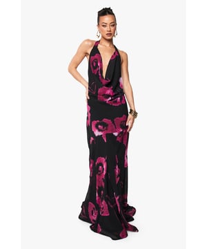 Tall fit maxi dress designed with a striking floral print throughout
        Elegant halterneck design with a dramatic waterfall neckline for a bold statement
        Figure-flattering silhouette with a floor-sweeping length
        Lightweight chiffon fabric that flows beautifully with movement
        Open back detail adds a touch of allure to this showstopping piece
    
    Command attention at your next night out in this stunning floral chiffon maxi dress from Boohoo. The halterneck design frames your dcolletage beautifully, whilst the daring waterfall neckline creates a captivating focal point. The flowing silhouette skims your curves in all the right places, with the lightweight chiffon fabric adding graceful movement as you walk. Style with statement gold jewellery as seen on our model - bold earrings and stacked bracelets complement the dramatic aesthetic perfectly. Complete your look with strappy heels and a compact clutch for drinks with the girls or a special date night. This dress transitions effortlessly from summer soires to autumn events with the addition of a tailored blazer.