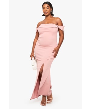 Elegant Bardot neckline with graceful off-shoulder design
        Figure-enhancing wrap style with ruched detailing for a flattering silhouette
        Scuba crepe fabric offering structure and comfort throughout the evening
        Dramatic side split for effortless movement and contemporary appeal
        Floor-sweeping maxi length creating a sophisticated, statuesque profile
    
    Make a striking entrance at your next formal occasion in this showstopping Bardot maxi dress. The wrap design with ruched detailing accentuates your curves beautifully, whilst the off-shoulder neckline presents a timelessly elegant look. The scuba crepe fabric provides just the right amount of structure whilst ensuring comfort for all-night wear. Style with strappy metallic heels as shown and a sleek clutch for a refined ensemble. Perfect for weddings, graduation ceremonies or summer galas, this dress offers versatility for various formal settings. The dramatic side split adds a contemporary touch to the classic silhouette, allowing for graceful movement whether you're mingling at a champagne reception or dancing the night away.