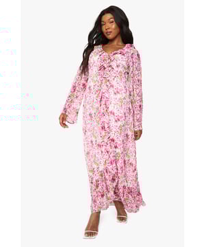 Flowing chiffon maxi dress with romantic floral pattern throughout
        Elegant V-neckline with feminine rose detail for added charm
        Flattering plus size fit designed to enhance your curves
        Long sleeves with subtle flare for a graceful silhouette
        Sweeping maxi length with delicate ruffle hem detail
    
    Make a statement at your next evening out with this enchanting floral chiffon maxi dress from Boohoo. The lightweight, flowing fabric creates movement with every step, whilst the rose detail at the neckline adds a touch of romantic flair. Perfect for summer soires or cocktail evenings, this dress can be styled with strappy heels and a clutch bag for a night at the bar with friends. For cooler evenings, layer with a cropped jacket or wrap. The versatile design transitions effortlessly from casual daytime gatherings to more glamorous night-time events - simply switch up your accessories to customise your look. The flattering cut celebrates your curves whilst the maxi length offers both comfort and sophistication, ensuring you'll feel confident and stylish throughout your evening adventures.