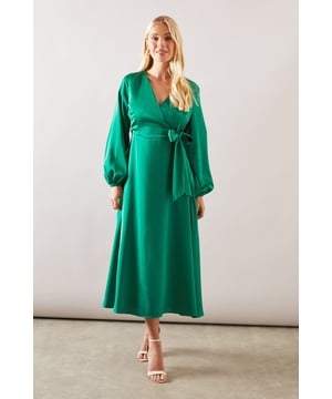 Elegant satin wrap midi dress with flattering V-neckline
        Sophisticated balloon sleeves add a touch of drama to this feminine silhouette
        Self-tie belt to accentuate the waist for a customised fit
        Flowing midi length skirt with gentle A-line shape
        Fully lined for comfort and smooth drape against the skin
    
    This Wallis Petite Satin Wrap Midi Dress combines sophistication with everyday wearability. The lustrous satin fabric catches the light beautifully whilst maintaining a relaxed daytime appeal. Style with strappy heeled sandals as shown for family gatherings or pair with a cropped denim jacket and trainers for a more casual look. The wrap design is wonderfully versatile, allowing you to adjust the fit to your preference, while the midi length offers a graceful silhouette suitable for various occasions. Perfect for garden parties, brunches or informal celebrations, this dress will become a go-to piece in your wardrobe. The balloon sleeves add a contemporary touch to this timeless design, making it both on-trend and enduringly stylish for the fashion-conscious woman who values both comfort and glamour.