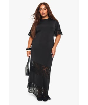 Maxi T-shirt dress with elegant lace panel inserts for a contemporary twist
        Relaxed, oversized fit with short sleeves featuring delicate lace trim detailing
        Floor-length design with striking sheer lace sections at the hem and mid-section
        Simple round neckline for a classic, versatile silhouette
        Inclusive plus-size design that celebrates and flatters your curves
    
    Make a statement after dark in this show-stopping maxi T-shirt dress. The relaxed silhouette combines casual comfort with night-out glamour, featuring striking lace panels that add a touch of allure whilst maintaining sophistication. Style with chunky platform boots as seen on our model for an edgy urban look, or dress up with strappy heels and statement jewellery for cocktails with the girls. The versatile design transitions effortlessly from casual drinks to club nights-simply switch up your accessories to match the vibe. Add a leather jacket and clutch bag for cooler evenings, or keep it minimal with bold cuffs and a sleek handbag. This dress offers the perfect balance of comfort and head-turning style for your next night out.