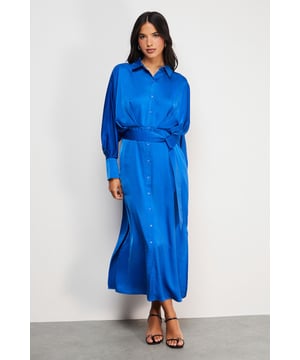 Striking batwing sleeves for a dramatic silhouette
        Elegant midi length with a daring side split
        Collared neckline adds a touch of sophistication
        Button-down front for versatile styling options
        Cinched waist design creates a flattering shape
    
    This satin shirt dress from Warehouse is a versatile piece that effortlessly transitions from day to night. The batwing sleeves create a bold, contemporary look, while the midi length with a side split adds a hint of allure. Perfect for confident women who appreciate edgy yet feminine styles, this dress can be styled for various casual occasions. For a chic daytime ensemble, pair it with ankle boots and a crossbody bag for a family lunch or weekend outing. Layer with a leather jacket for an edgier look when meeting friends for coffee. The button-down front allows for customisable coverage, making it suitable for different settings. Accessorise with statement earrings and a sleek updo for an evening dinner date. The dress's fluid silhouette and rich texture make it a standout piece in any wardrobe, ideal for those who want to make a subtle yet impactful fashion statement.