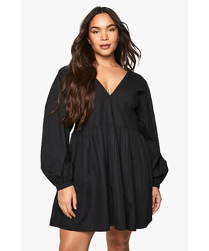 Flattering smocked design creates a beautiful silhouette with effortless comfort
        Dramatic blouson sleeves add a touch of romance to this casual dress
        V-neckline frames the dcolletage for a feminine finish
        Open back detail with tie fastening creates an unexpected statement
        Relaxed fit with gentle gathering provides movement and ease
    
    This boohoo smocked dress combines comfort with contemporary style for your everyday wardrobe. The relaxed silhouette features voluminous blouson sleeves that create a beautiful shape, while the smocked detailing adds texture and interest. The open back with tie fastening offers a subtle yet striking detail when you turn around. Style with minimal jewellery and flat sandals for daytime gatherings, or dress it up with statement earrings and chunky trainers for brunch with the girls. The versatile design works brilliantly for family occasions or casual weekend outings-simply throw on a denim jacket and crossbody bag when temperatures drop. This fuss-free piece delivers maximum impact with minimal styling effort, making it a perfect addition to your casual collection.