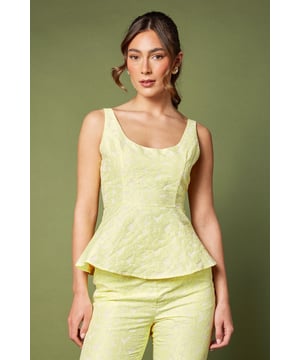 Elegant sleeveless design with sophisticated jacquard texture
        Flattering peplum silhouette that accentuates the waistline
        Refined square neckline for a contemporary touch
        Structured bodice with subtle shaping for a polished look
        Fully lined for comfort and a smooth finish
    
    This exquisite jacquard peplum top from Coast embodies refined elegance for your special occasions. The structured bodice with its contemporary square neckline creates a flattering frame for your dcolletage, whilst the peplum detail gracefully highlights the waist for a feminine silhouette. As shown, pair with coordinating trousers for a sophisticated co-ord ensemble perfect for summer weddings or race day events. Alternatively, style with a tailored pencil skirt and strappy heels for evening soires. Complete your look with delicate jewellery and a clutch bag for occasions where making an impression matters. The versatile design transitions beautifully from formal daytime events to elegant evening gatherings, making it a valuable addition to your occasion wardrobe.