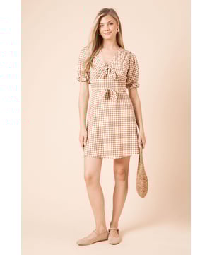Charming gingham pattern mini dress with decorative bow front detail
        Feminine V-neckline complemented by a second bow at the waist
        Delightful puff sleeves with elasticated cuffs for a romantic silhouette
        Flattering A-line shape that skims the figure beautifully
        Versatile mini length perfect for showcasing your favourite footwear
    
    This delightful gingham mini dress captures the essence of effortless British style with its playful bow details and feminine puff sleeves. The V-neckline creates a flattering frame for your face, while the second bow at the waist adds definition to your silhouette. Perfect for casual gatherings, this dress pairs wonderfully with flat ballet pumps and a woven bag for weekend brunches with the girls. For family gatherings or baby showers, style with simple gold-toned jewellery and comfortable ankle boots. The slight stretch in the fabric ensures all-day comfort without compromising on style. This Dorothy Perkins dress transitions seamlessly from daytime outings to early evening drinks - simply swap your day bag for a clutch and you're ready for whatever the day brings. Machine washable for practical everyday wear.