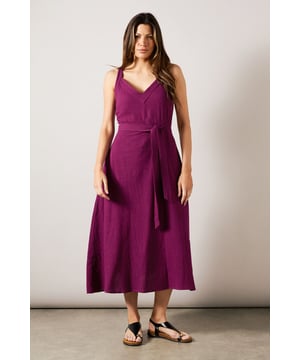 Elegant V-neckline with adjustable shoulder straps for a customised fit
        Textured cotton fabric adds subtle dimension and visual interest
        Flattering fit and flare silhouette that cinches at the waist
        Practical side pockets perfect for everyday essentials
        Versatile midi length with a graceful A-line skirt that moves beautifully
    
    This sophisticated textured midi dress combines comfort with effortless style for your daytime wardrobe. The flattering fit and flare design creates a feminine silhouette, whilst the self-tie belt accentuates the waist beautifully. Style with flat sandals and a woven tote for casual family gatherings, or dress up with espadrille wedges and statement earrings for lunch with friends. The breathable cotton fabric ensures all-day comfort, making it ideal for summer garden parties or weekend brunches. Layer with a lightweight cardigan and ankle boots when temperatures drop, or add a denim jacket for a more relaxed look. This versatile Wallis dress transitions seamlessly from day to evening, offering sophisticated style without compromising on comfort.