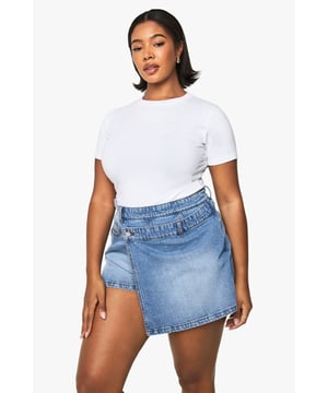 Innovative denim skort design combining shorts with a stylish overlay skirt
        Cotton fabric provides breathable comfort for all-day wear
        Practical front pocket detail for added functionality
        Versatile mid-rise waistband offers comfortable fit
        Classic denim wash perfect for creating countless casual outfits
    
    These Plus Denim-Skorts from Boohoo deliver the best of both worlds - the comfort of shorts with the feminine flair of a skirt. Style them with a fitted white tee and oversized blazer for a contemporary casual look that transitions effortlessly from daytime shopping to casual meetups with friends. For warmer days, pair with a cropped top and trainers, adding a cap for that street-style edge. The versatile design works brilliantly for family gatherings or weekend brunches - simply switch up your accessories to refresh the look. These skorts are ideal for those moments when you want to feel comfortable yet put-together, offering practical style that doesn't compromise on fashion-forward appeal. Perfect for the woman who values both style and comfort in her everyday wardrobe.