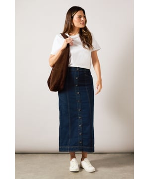 Striking midaxi length denim skirt with distinctive vertical seam detailing
        Front button-through design with metal buttons for a classic denim aesthetic
        Practical side pockets perfect for everyday essentials
        Flattering A-line silhouette that gently flares from the waist
        Subtle back slit detail for ease of movement and added comfort
    
    This sophisticated Seam Detail Midaxi Denim Skirt from Wallis combines timeless style with contemporary design. The vertical seam detailing creates a slimming effect while the classic button-through front adds a touch of casual charm. Style with a simple white t-shirt and leather sandals for relaxed weekend brunches, or pair with a tucked-in blouse and ballet flats for family gatherings. The versatile midaxi length works beautifully for various daytime occasions, from shopping trips to casual lunch dates. For cooler days, layer with a lightweight jumper and trainers for an effortlessly chic look. The cotton fabric provides breathable comfort throughout the day, while the practical pockets add functionality to this wardrobe staple. This skirt transitions seamlessly from season to season, making it a truly versatile addition to your casual collection.