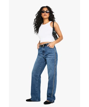 Straight leg jeans with eye-catching side stripe detail
        High-rise waist for a flattering silhouette
        Classic five-pocket design for practicality
        Belt loops for versatile styling options
        Comfortable cotton-blend fabric for all-day wear
    
    Make a statement with these trendy straight leg jeans from Boohoo. The standout side stripe adds a contemporary twist to a timeless denim staple, perfect for the fashion-forward woman who loves to stay ahead of the curve. Pair these jeans with a cropped vest top and trainers for a casual daytime look that's both comfortable and stylish. For a more polished ensemble, team with a crisp white shirt and ankle boots. The versatile design makes these jeans suitable for various casual occasions, from coffee dates with friends to family gatherings. The high-rise waist and straight leg cut create a flattering silhouette that complements a range of body types, embodying Boohoo's commitment to inclusivity. Embrace your individuality and make these jeans the cornerstone of your casual wardrobe.