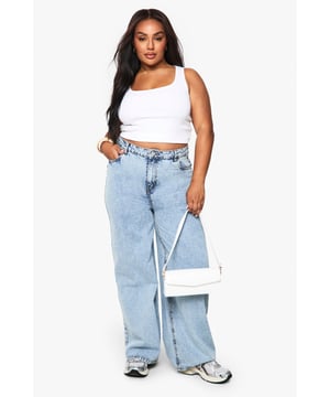 Classic straight leg design offering a flattering silhouette for all body types
        High-rise waistband for comfortable all-day wear
        Traditional five-pocket styling with functional front and back pockets
        Wide leg opening perfect for showcasing your favourite footwear
        Part of the Boohoo Basics Plus collection, designed for versatile everyday styling
    
    These straight leg jeans from Boohoo Basics Plus are the wardrobe essential your collection has been waiting for. The relaxed straight cut creates a balanced silhouette that works brilliantly for casual daytime looks. Style them as shown with a fitted crop top and trainers for an effortlessly cool weekend outfit, or dress them up with a blouse and heeled boots for evening gatherings. The high-rise waist offers both comfort and style, while the classic denim fabric ensures durability for everyday wear. These jeans transition seamlessly from family brunches to casual Fridays at work, and even relaxed evening outings with friends. Their timeless design makes them the perfect foundation piece to build countless outfits around, regardless of the season.