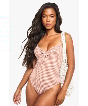 Make a splash in our stylish swimwearBagging yourself the perfect bikini is the secret to feeling body beautiful at the beach. Whether you prefer triangle or bandeau, high waisted or hipster, we&rsquo;ve got swimwear styles to flatter every figure. This season we&rsquo;re talking about the tropical two piece, clashing it with a quirky kimono and adding fashion&rsquo;s hottest headwear, the floppy hat, for plenty of poolside pizazz.