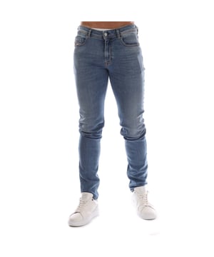 Mens Diesel 1979 Sleenker Low-Rise Skinny-Fit Jeans in denim.- 5-pocket construction. - Zip fly and button fastening.- Six belt loops on the waistband.- Branded strip across small pocket.- Faded.- Skinny fit. - 96% Cotton  3% Elastomultiester  1% Elastane.- Ref: A0359609C0101