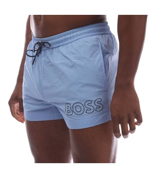 Mens Hugo Boss Mooneye Swim Shorts in blue.- Elastic waistband.- Side pockets.- Short length.- Plastic-tipped drawcords with further branding complete this pair.- Printed with a large BOSS logo.- 100% Polyamide.- Ref: 50469280430