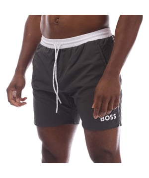 Mens Hugo Starfish Swim Shorts in charcoal.- Elasticated drawstring waist.- Side pockets.- Back pocket.- Boss branding on the leg.- Mesh polyester lining enhances breathability and comfort for a seamless swimming experience.- 100% Polyester (Recycled).- Ref: 50515191011