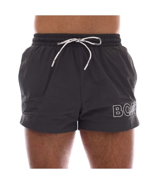 Mens Hugo Boss Mooneye Swim Shorts in charcoal.- Elastic waistband.- Side pockets.- Short length.- Plastic-tipped drawcords with further branding complete this pair.- Printed with a large BOSS logo.- 100% Polyamide.- Ref: 50469280011