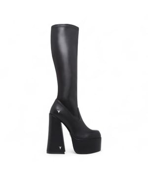 Own the spotlight in the Windsor Smith Survival black stretch platform boots. These striking knee-high sock boots feature a sleek, non-leather upper that hugs the leg for a bold, sculpted silhouette. Set on towering 15.2 cm chunky block heels with a 5.7 cm platform, they offer dramatic height without compromising stability. Complete with Windsor Smith's iconic bullhead logo on the heel and sole, these boots are designed to turn heads and elevate your wardrobe.

Upper: Black Stretch (Non-Leather)
Lining: Non-Leather
Sole: Non-Leather
Style: Knee-high sock boots
Heel Height: 15.2 cm
Platform Height: 5.7 cm
Design: Chunky platform block heel