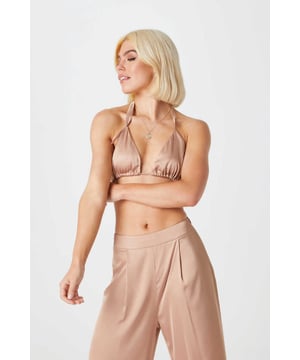 Party season has arrived
and we have the perfect 'fit!
Featuring a tie neck and back.
Team our Satin Bralet with our Satin Trousers
and complete the look with our Satin Blazer! 