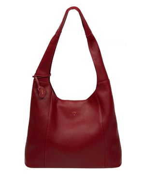 The 'Renata' shoulder bag from NiNa Amora elevates this design with the natural leather exeterior with a soft to the touch pebble grain finish. A open-top design gives it a relaxed slouchy look and conceals the spacious main compartment. This is comnplemented by a zipped pocket on the lined interior for a robust finish. A chunky single handle adorns this style and makes it comfortable to wear all day long. This is all finished with the NiNa Amora X logo embossed in stunning silver foil on the front and hanging charm for a luxurious finishing touch.