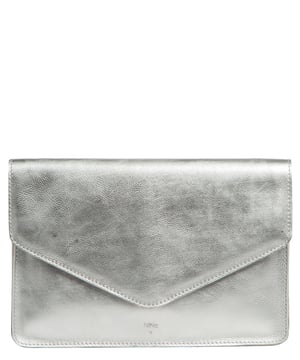As part of the NiNa Amora brand, the'Ana' clutch is inspired by our designer's daughter and all about elevating classic designs with high quality leather craftsmanship. This styles features an simply elegant envelope design elevating the the clutch to chic new heights, all secured with a press stud fastener for the fold-over top. Under the fold-over top you will find a zipped pocket - perfect for maintaining an organised accessory. Silver metal fittings give this design an elegant look alongside the luxurious finishing touch that is the NiNa Amora X logo being blind embossed on the front.