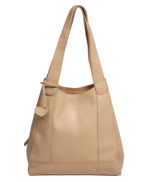 As part of the Nina Amora range, the 'Celeste' handbag is inspired by our designer's daughter and all about elevating classic designs through high quality natural leather with a pebble grain finish. A unique trio of compartments provide ample space for all your essentials with the central  compartment being secured with a zip over top. On either side you will find slip sections, perfect for on-the-go storage.  Additional storage space is provided by a internal zipped pocket - perfect for your phone and keys. Dual leather handles adorn the 'Celeste' with a drop lenght of 25cm. Metal fittings and zips give this design an elegant look which alongside the NiNa Amora X logo embossed on the front and hanging charm adding a luxurious finishing touch.