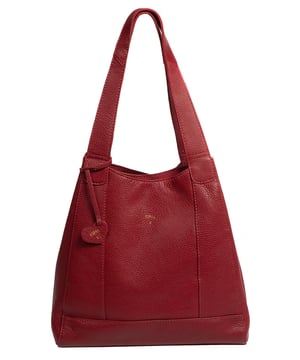 As part of the Nina Amora range, the 'Celeste' handbag is inspired by our designer's daughter and all about elevating classic designs through high quality natural leather with a pebble grain finish. A unique trio of compartments provide ample space for all your essentials with the central  compartment being secured with a zip over top. On either side you will find slip sections, perfect for on-the-go storage.  Additional storage space is provided by a internal zipped pocket - perfect for your phone and keys. Dual leather handles adorn the 'Celeste' with a drop lenght of 25cm. Metal fittings and zips give this design an elegant look which alongside the NiNa Amora X logo embossed on the front and hanging charm adding a luxurious finishing touch.