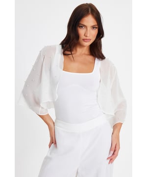 - Sheer finish - Cropped sleeves - Flowy design - Pearl embellishment - Always check the wash care label - Cool hand wash with mild detergent