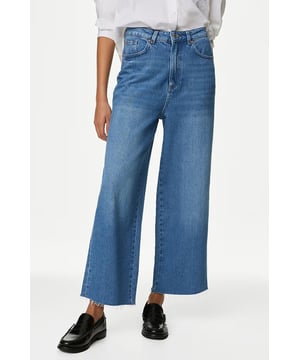 These lyocell blend ankle-grazing jeans are designed to flatter your figure. They come with a high waist and on-trend wide leg along with contemporary raw hems. The denim is soft and stretchy for ultimate comfort. A button and zip fastening, belt loops and five pockets make for a classic finish.

Short 26" | Reg 28" | Long 30".