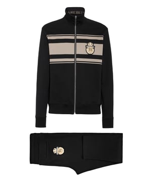 Geef je trainingsoutfit meer pit met dit katoenen fleece joggingpak met kleurblokken. Het borduursel van het iconische Crest en de jacquard gestreepte zijbanden sieren de set. Het sweatjack met rits heeft twee steekzakken. De broek heeft een trekkoord in de taille, twee zakken aan de voorkant en een steekzak aan de achterkant. In de ribgebreide zomen is de Brand jacquard aan de binnenkant geweven.