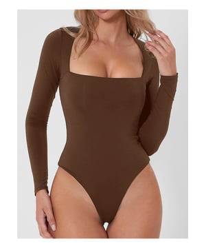 Estilo basico.
  Transparente: opaco.
  Elastico: Ligeramente elastico.
  Composicion del material: 95% poliester 5% spandex.
  Instrucciones de cuidado: Lavar a maquina con agua fria. Secar en secadora a baja altura..
  Importado.
  Talla S: Largo superior 27.6 pulgadas Busto 30.7 pulgadas Largo de la manga 22.8 pulgadas Hombro 13 pulgadas.
  Talla M: Largo superior 28 pulgadas Busto 32.3 pulgadas Largo de la manga 23.2 pulgadas Hombro 13.4 pulgadas.
  Talla L: Longitud superior 28.3 pulgadas Busto 33.9 pulgadas Longitud de la manga 23.6 pulgadas Hombro 13.8 pulgadas.