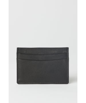 Genuine leather cardholder with multiple card slots for organised storage
        Slim, compact design that fits easily into trouser or jacket pockets
        Streamlined silhouette perfect for carrying essential cards without bulk
        Durable construction for everyday use and longevity
        Classic Burton styling with understated, timeless appeal
    
    This sleek leather cardholder from Burton offers practical functionality with a refined touch. The minimalist design houses multiple card slots whilst maintaining an impressively slim profile that won't create unsightly bulges in your favourite jeans or tailored trousers. Perfect for the modern gent who values both style and practicality, this cardholder is ideal for everyday use - whether you're heading to work, meeting mates at the pub, or attending a weekend football match. Pair with your casual weekend attire or your workday ensemble for a sophisticated finishing touch. The genuine leather construction ensures durability whilst developing a distinctive patina over time, making this accessory uniquely yours. A smart alternative to a bulky wallet when you're travelling light or heading out for the evening.