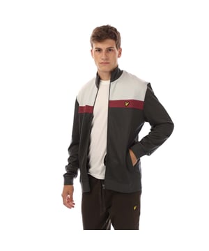 Heren Lyle And Scott Colour Block Track Jacket in grijs.- Opstaande kraag.- Volledige ritssluiting.- Zijzakken.- Geribde manchetten en zoom.- Colour Block ontwerp.- Golden Eagle logo op de borst.- Body: 70% Viscose 22% Polyamide 8% Elastane. Voering: 100% katoen.- Ref: ML2084SPX129