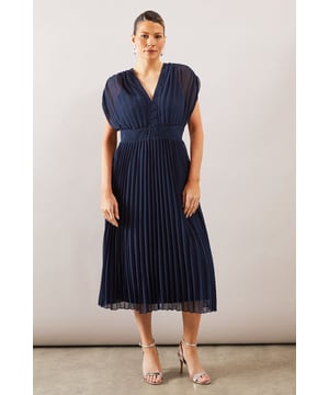 Elegant pleated chiffon midi dress with a flattering V-neckline
        Sophisticated cap sleeve design with gentle draping for a feminine silhouette
        Defined waistband creates a structured yet comfortable fit
        Button detail along the bodice adds a refined touch
        All-around pleating creates beautiful movement when walking
    
    This graceful pleated midi dress from Wallis embodies timeless sophistication for your special occasions. The flowing chiffon fabric moves beautifully with every step, while the V-neckline frames your dcolletage with understated elegance. Perfect for weddings, formal events or race day, this dress offers versatility in styling. Pair with metallic strappy heels and statement earrings as shown for a polished ensemble. For cooler evenings, layer with a tailored blazer or delicate wrap. The midi length strikes the perfect balance between formal and practical, ensuring you remain comfortable throughout your event whilst maintaining a refined appearance. This Wallis piece transitions effortlessly from day to evening occasions with simple accessory changes.