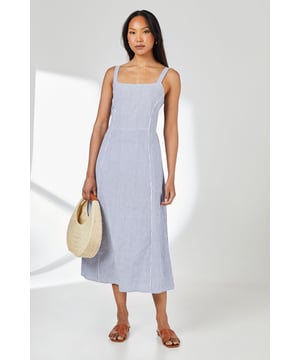 Elegant square neckline with supportive wide straps for all-day comfort
        Flattering midaxi length hitting between mid-calf and ankle
        Classic stripe pattern adds visual interest to this versatile piece
        Crafted from breathable cotton fabric, perfect for warm-weather wear
        Elasticated back panel provides a comfortable, adjustable fit
    
    This charming striped cami dress from Principles combines effortless style with day-long comfort. The square neckline frames your dcolletage beautifully, while the midaxi length creates a graceful silhouette that works wonderfully for various occasions. Style with flat sandals and a woven tote bag for casual weekend brunches or farmers' market visits. For a more polished daytime look, layer with a lightweight denim jacket and add espadrilles. The cotton fabric ensures breathability during warmer months, making it ideal for garden parties or seaside strolls. This versatile dress transitions seamlessly from city exploring to countryside rambles - simply switch your accessories to suit the setting. The timeless stripe pattern ensures this piece will remain a wardrobe favourite for seasons to come.