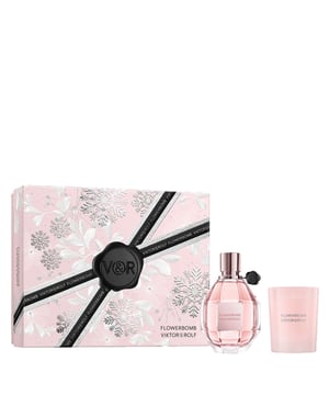 Unleash a floral delight with the Viktor&Rolf Flowerbomb Eau de Parfum Gift Set. This exquisite set features the iconic Flowerbomb Eau de Parfum, a captivating blend of floral and woody notes that creates a mesmerizing fragrance experience. The top notes of refreshing Bergamot and delicate Freesia lead into a heart of lush Sambac Jasmine and romantic Centifolia Rose. Completing this fragrant journey are warm base notes of Amber and Patchouli. Perfect for gifting, this set includes a 100ml Eau de Parfum and a 70g Viktor&Rolf Candle, ideal for creating a luxurious atmosphere.