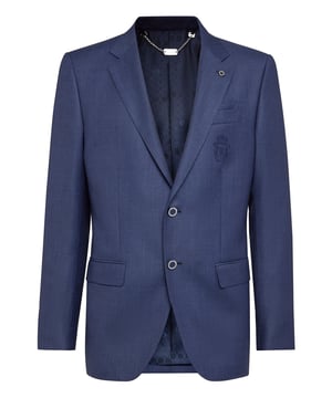 Esta chaqueta de lana tejida, clásica y deportiva, es una llave maestra que necesitas tener en tu armario. La chaqueta de modelo cruzado presenta todos los elementos básicos, incluido el bolsillo en el pecho. Dos bolsillos con solapa.  El emblema de la marca está bordado en el pecho izquierdo. Los botones metálicos esmaltados en el centro. Dos cortes en la espalda. Forro interior. Corte: Tailored.