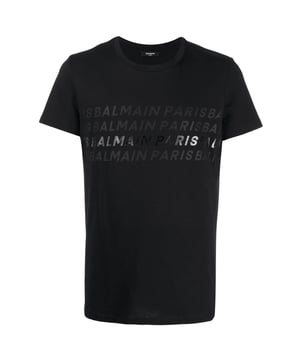 Elevate your wardrobe with the Balmain Paris Multi Logo Black T-Shirt, a striking piece crafted from 100% premium cotton for exceptional comfort and durability. Made in Portugal, this T-shirt features a bold multi-logo design that showcases Balmain's iconic style and attention to detail. Its sleek black color offers versatile wearability, perfect for making a statement whether dressed up or down. Experience luxury and effortless fashion combined in this must-have addition to your collection. Ideal for those who appreciate high-quality craftsmanship and contemporary design