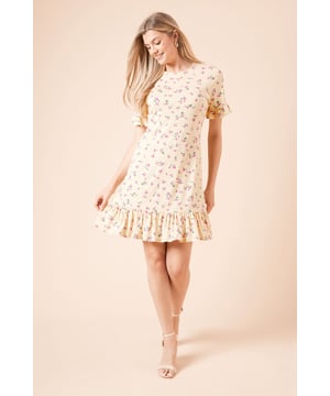 Charming ditsy floral print jersey mini dress with delicate short sleeves
        Comfortable crew neckline perfect for everyday wear
        Soft jersey fabric with slight stretch for all-day comfort
        Feminine frill hem detail adds playful movement
        Figure-flattering mini length with a relaxed silhouette
    
    This delightful Dorothy Perkins mini dress combines comfort with effortless style. The soft jersey fabric gently skims your figure whilst offering just the right amount of stretch for day-long comfort. The playful frill hem creates a feminine flourish that moves beautifully as you walk. Style with simple strappy sandals as seen on our model for casual brunches with friends, or pair with white trainers and a denim jacket for family gatherings. For cooler days, layer with a lightweight cardigan and ankle boots. This versatile piece transitions seamlessly from garden parties to baby showers - simply customise with your favourite accessories. The modest crew neckline and mini length strike the perfect balance between trendy and tasteful, making this dress a wardrobe essential for the modern woman.