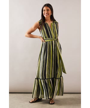 Sleeveless maxi dress with eye-catching vertical stripe pattern
        Elegant crew neckline with subtle V-opening at the front
        Flattering self-tie belt to define and accentuate the waist
        Feminine tiered design creating beautiful movement and volume
        Floor-length silhouette for a sophisticated daytime look
    
    This striking striped maxi dress from Wallis combines comfort with sophisticated style for effortless daywear glamour. The tiered design creates beautiful movement as you walk, whilst the self-tie belt cinches the waist for a flattering silhouette. Perfect for summer gatherings, style with flat sandals as seen on our model for a relaxed garden party or family lunch. For cooler days, layer with a lightweight cardigan and add a structured tote bag. The versatile design transitions seamlessly from casual weekend brunches to afternoon social events. The woven fabric drapes beautifully while maintaining its shape throughout the day, ensuring you look polished without compromising on comfort. This dress reflects Wallis' signature sophisticated aesthetic whilst offering practical elegance for the woman who values both style and ease.