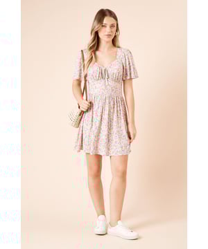 Charming ditsy print mini dress with feminine sweetheart neckline
        Elegant tie-front detail adds a delicate touch to the bodice
        Flutter sleeves create movement and soft coverage for the arms
        Flattering shirred waist panel defines your silhouette beautifully
        Comfortable stretch woven fabric ensures all-day wearability
    
    This Dorothy Perkins mini dress captures effortless femininity with its pretty ditsy print and considered details. The sweetheart neckline with tie-front accent creates a flattering focal point, while the flutter sleeves offer just the right amount of coverage. Style with white trainers and a woven basket bag for weekend brunches with the girls, or dress it up with ballet flats and delicate jewellery for family gatherings. The shirred waist panel creates a figure-enhancing silhouette that's both comfortable and stylish. Perfect for garden parties, casual outings, or baby showers, this versatile dress transitions seamlessly from day to evening with simple accessory changes. Layer with a denim jacket when the temperature drops for an outfit that reflects contemporary British style.