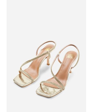 Step out in style and sophistication with our Amanda Crystal Cross Foot Strap Mid Heels. These stunning shoes are designed to elevate your outfit and add a touch of glamour to every step. Key Features: • Crystal Embellishments: The sparkling crystal details on these mid heels add an exquisite and luxurious touch, perfect for those who want to make a statement. • Breathable Design: The open toe front and heel provide breathability, ensuring your feet stay cool and comfortable even on warmer days. • Comfortable Height: These heels provide elegance and style, while the cushioned insole ensures all-day comfort. Walk confidently knowing that your feet will stay comfortable, no matter where the day takes you. • Versatile Style: These shoes are versatile and can be paired with a variety of outfits. Dress them up with a formal dress for a night out or add a touch of glamour to your everyday jeans and blouse ensemble. The options are endless. Specifications: • Material: Faux Leather • Crystal Embellishments: Sparkling crystals add a touch of luxury and sophistication • Closure: Slip On Elevate your style and make a statement with our Amanda Crystal Cross Foot Strap Mid Heels. Combining fashion and functionality, these shoes allow you to showcase your individuality while enjoying all-day comfort. Step out with confidence and embrace your inner trendsetter.