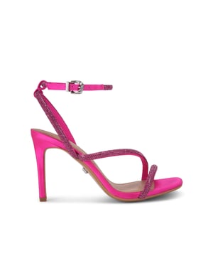 The Carvela Paparazzi upper is in a fuchsia satin fabric with small pink jewels across each of the straps with a buckle fastening on the ankle. Heel height: 90mm. This product features All Day Long technology.