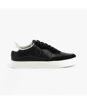 Calvin Klein casual trainers feature a leather upper, textile lining, and rubber sole. Designed for comfort and breathability, they are ideal for everyday casual wear with a low heel and lace-up closure