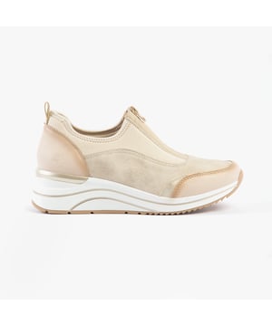 These casual women's trainers feature a synthetic upper, textile lining, rubber sole, and a low wedge heel. Designed for comfort with an extra-wide fit and zip closure for easy wear