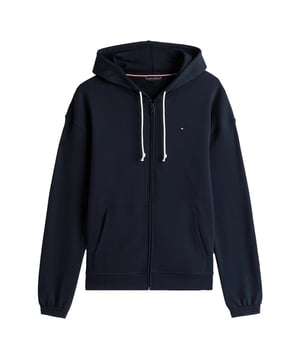 Dit relaxed fit sweatjack voor heren is het toppunt van casual comfort. De capuchon met trekkoord biedt niet alleen bescherming, maar geeft de look ook een relaxte touch. Dankzij de doorlopende ritssluiting kan het jack flexibel gedragen worden - open, half of dicht. De gedeelde kangoeroezak biedt ruimte voor handen of kleine spullen en rondt het ontwerp functioneel af. Afhangende schouders zorgen voor een modern silhouet met extra bewegingsvrijheid. Elastische boorden aan de zoom en mouwen garanderen een perfecte pasvorm zonder beperkend te zijn. De hoogwaardige materiaalmix voelt aangenaam zacht aan en belooft optimaal comfort. Het discrete logoborduursel op de borst voegt een vleugje branding toe zonder overheersend te zijn. Veelzijdige combinatie - van urban tot cosy. Voor mannen die van comfort houden zonder afbreuk te doen aan stijl.