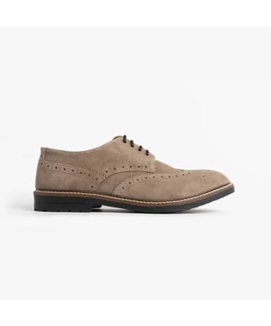 These beige brogue shoes feature a suede upper, textile lining, rubber sole, and lace-up closure. Designed for comfort, they are suitable for formal occasions and low-top style