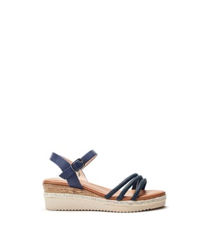 Keep it cool in Kandace. This strappy sandal features a cork heel cover with plaited trim detailing, perfect for your next holiday in the sun.